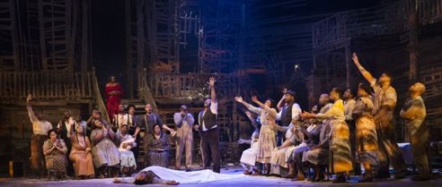 : Mourning Serena’s husband Robbins: Porgy (Derrick Lawrence, centre), Serena (Sabrina Elayne Carten, seated left of Porgy) and ensemble. Photo: Miklos Szabo